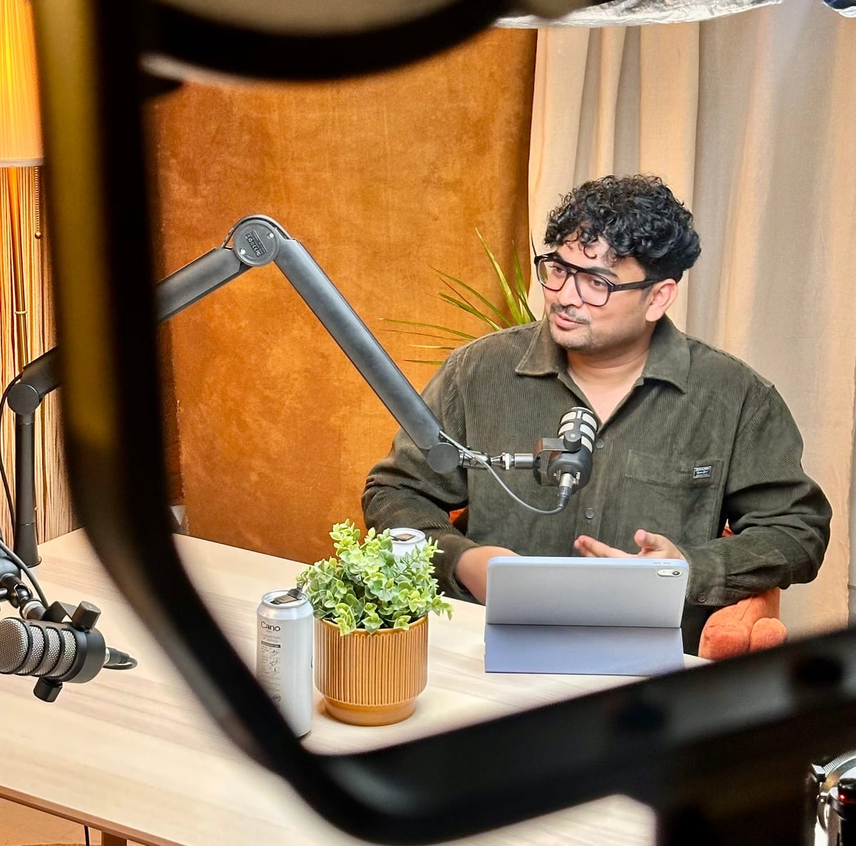 Surya Palli recording an episode